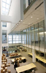 Another view of the skylit reading room of the Asher Library reveals its dramatic vertical space.