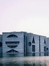 The National Assembly building at the capital complex in Dhaka, Bangladesh, begun in 1962 and completed in 1983. the photographer, Raymond Meier, is primarily known for his fashion work, but he was so captivated by Kahn's Dhaka buildings that they will be the subject of Meier's first book, to be published next year.